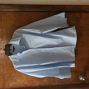 Light blue and white vertical striped button-down blouse.